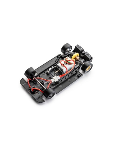 mecánica del modelo de slot Porsche 962C Joest Racing en pista de competición.